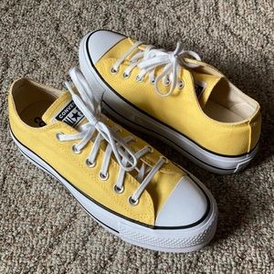 Yellow platform Converse shoes